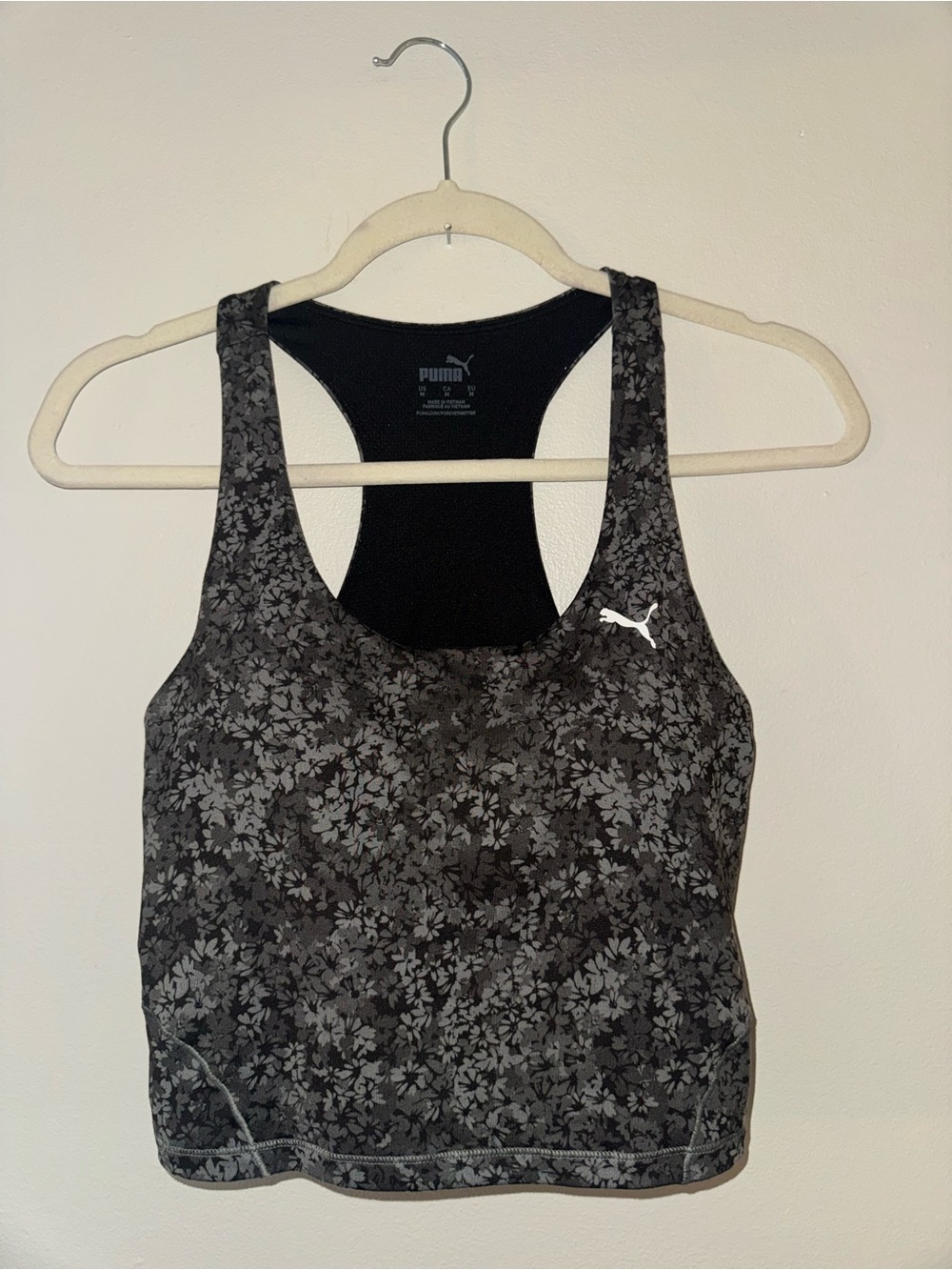 Like new, PUMA, gray and black floral raceback top with built in bra size medium
